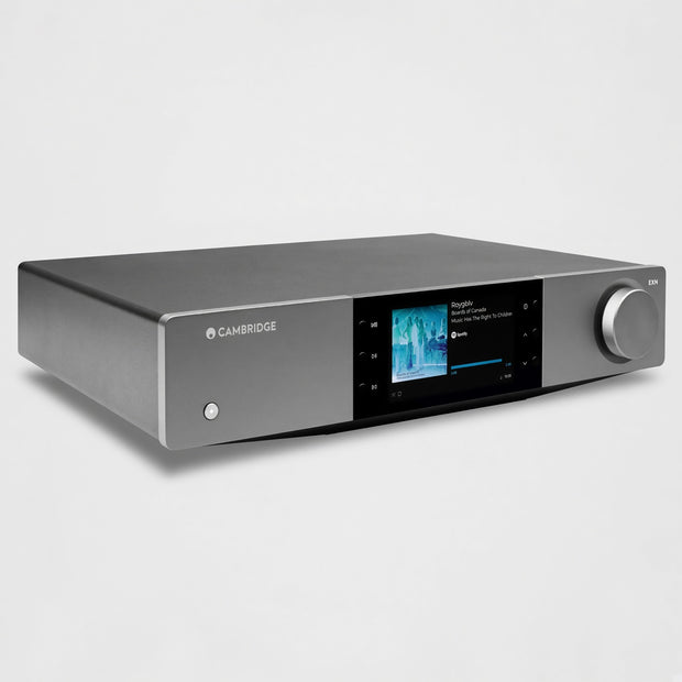 Cambridge Audio EXN100 network streamer three-quarter view, grey chassis with colour display and volume knob