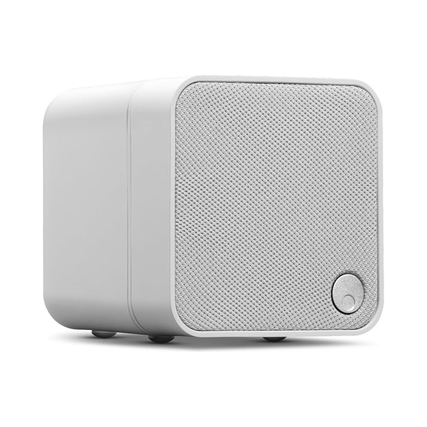 Cambridge Audio MSX10 passive speaker in white, three-quarter view with fabric grille