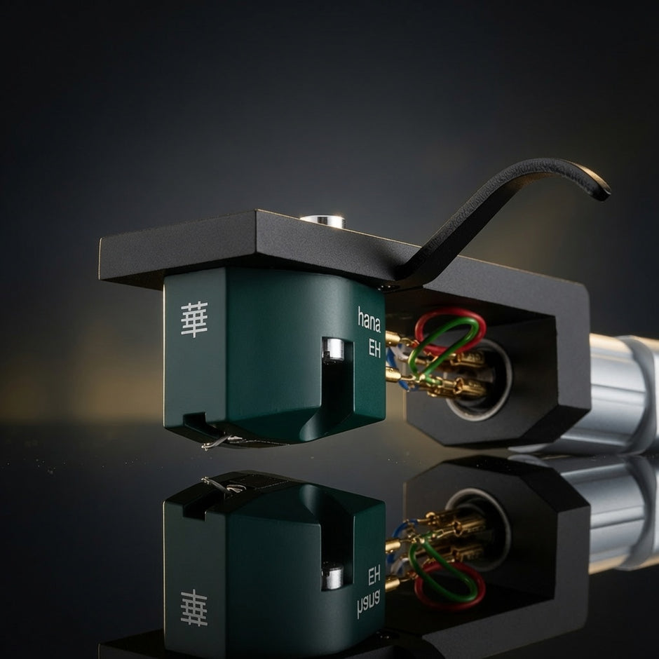 Close-up of Hana EH MC cartridge showing aluminum cantilever, elliptical stylus and green housing