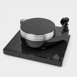 Angled view of Pro-Ject RPM 10 Carbon showing heavy aluminium platter and outboard motor