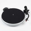 Pro-Ject RPM 1 Carbon turntable in high gloss white with S-shaped carbon tonearm